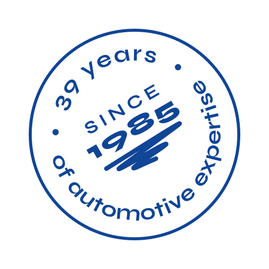 Badge "39 years of automotive expertise" in blue